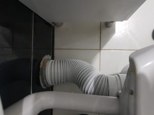 fix a broken toilet drain pipe