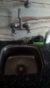 a clogged kitchen sink in landsmeer