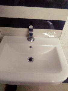 a clogged washing basin delft