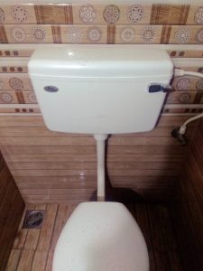 repairing an old toilet