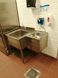 unclogging a washing basin